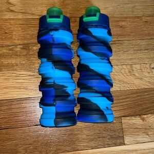 Pair of 2 collapsable blue water bottles with loop for key ring gently used.